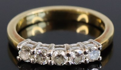 Lot 315 - An 18ct gold diamond half eternity ring,...