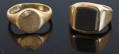 Lot 318 - A 9ct gold black onyx set signet ring, size N;...