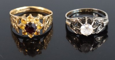 Lot 323 - A 9ct gold sapphire and white paste set dress...