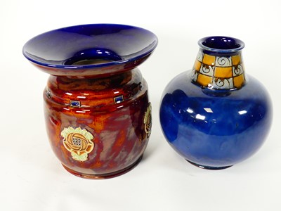 Lot 15 - A Royal Doulton stoneware vase, the tapering...