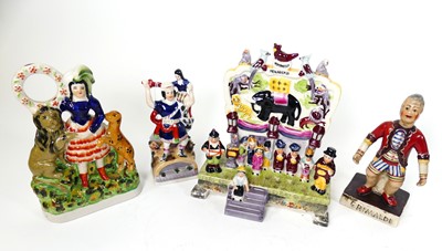 Lot 32 - A reproduction Staffordshire pottery figure...
