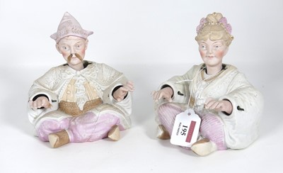 Lot 195 - A bisque pottery nodding figure of a lady,...