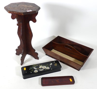 Lot 61 - An Arts & Crafts chip carved stained pine wine...