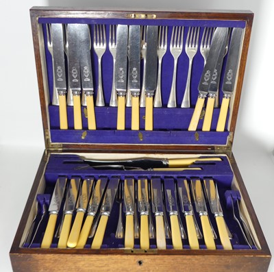Lot 233 - A 1930s canteen of silver plated cutlery, the...