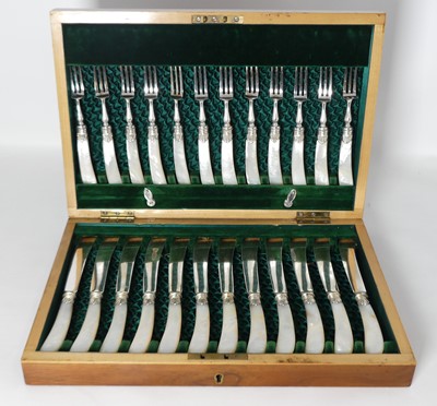 Lot 234 - A collection of twelve silver plated tea...