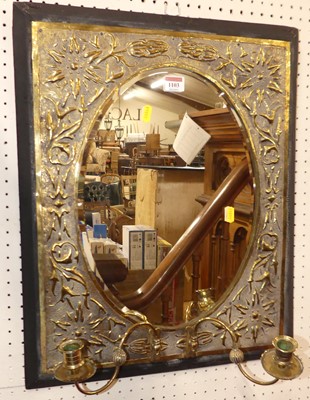 Lot 1103 - An Arts & Crafts period embossed brass framed...