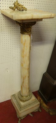 Lot 1110 - A circa 1900 onyx and gilt bronze mounted...