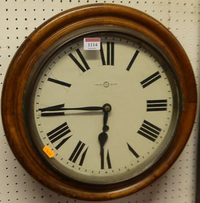 Lot 1114 - A circa 1900 oak circular wall clock, the...