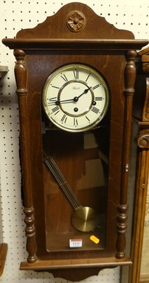 Lot 1122 - A contemporary beech droptrunk wall clock