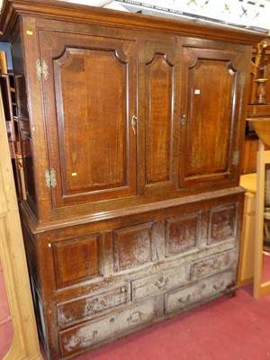 Lot 1159 - A joined oak converted wardrobe, having twin...