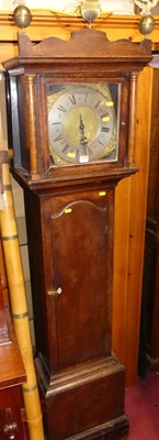 Lot 1161 - A circa 1800 provincial oak longcase clock,...
