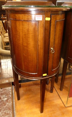 Lot 1233 - A mahogany rounded ledgeback single door...