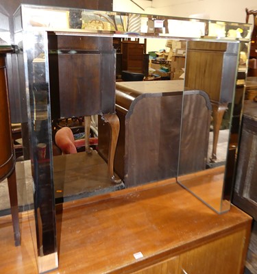 Lot 1234 - A contemporary bevelled mirrored glass console...