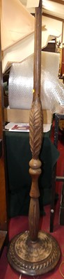 Lot 1168 - A carved and fluted beech standard lamp