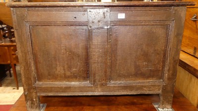 Lot 1176 - An antique joined oak two panelled hinge...