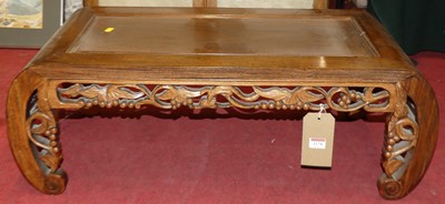 Lot 1178 - An Eastern hardwood low occasional table, with...