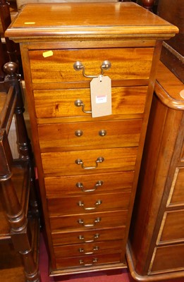 Lot 1187 - A contemporary hardwood narrow chest of ten...