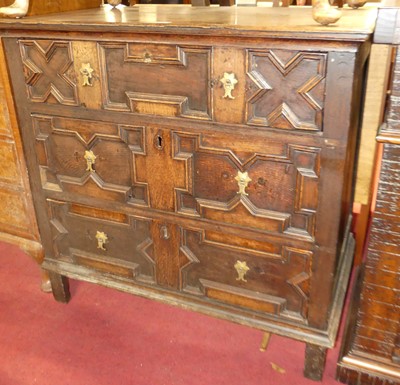 Lot 1254 - An antique oak three-drawer chest, in the...