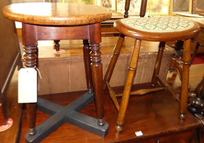 Lot 1199 - A burr wood topped oval stool, raised on ring...