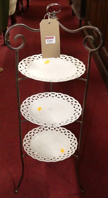 Lot 1264 - A wired metal three-tier cake stand, with...