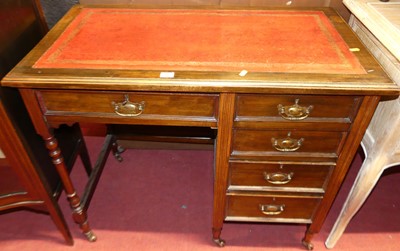 Lot 1207 - An Edwardian walnut and gilt-tooled red...