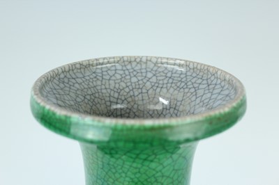 Lot 78 - A Chinese apple-green crackle-glazed vase,...