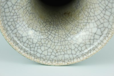 Lot 78 - A Chinese apple-green crackle-glazed vase,...