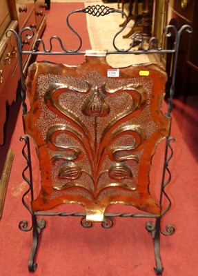 Lot 1208 - An Arts & Crafts floral embossed copper and...