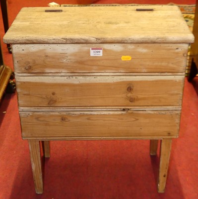 Lot 1209 - A rustic close-nailed pine hinge topped work...