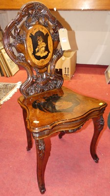 Lot 1217 - A 19th century Swiss stained walnut, carved...