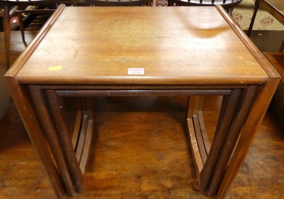 Lot 1220 - A 1960s G-Plan teak nest of three occasional...