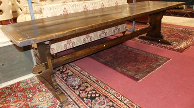 Lot 1278 - A large joined oak plank top refectory dining...