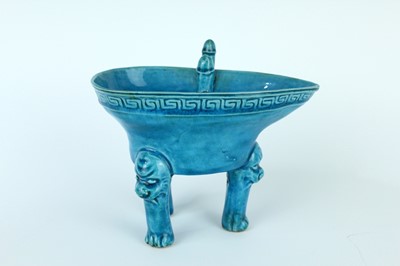 Lot 77 - A pair of Chinese turquoise-glazed ritual wine...