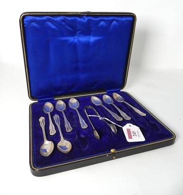 Lot 245 - A set of eight George V silver coffee spoons,...