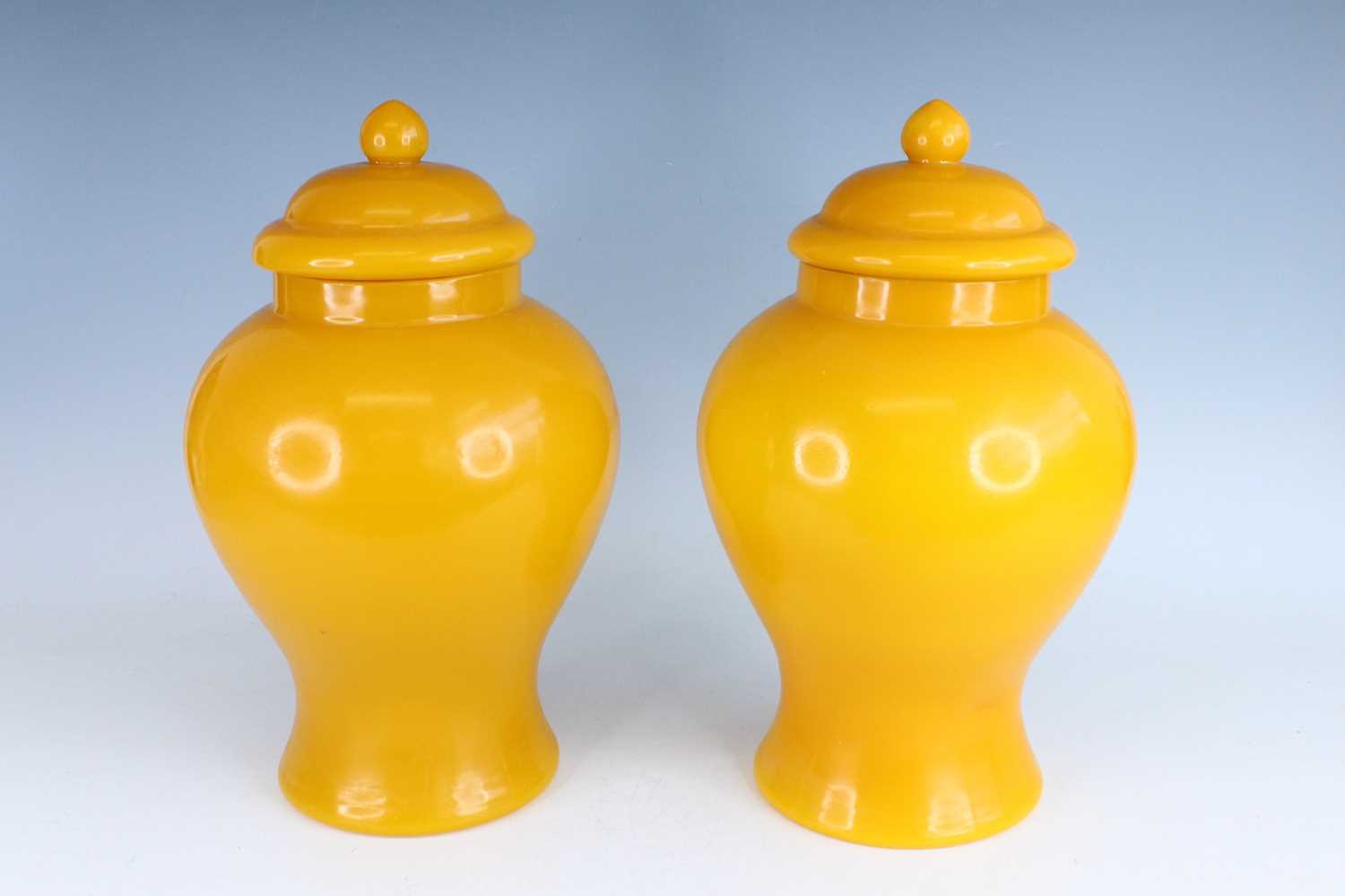 Lot 92 - A pair of Chinese yellow Peking glass jars...
