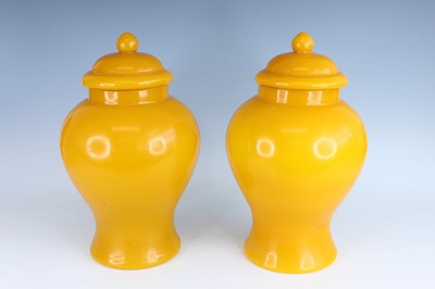 Lot A pair of Chinese yellow Peking glass jars...