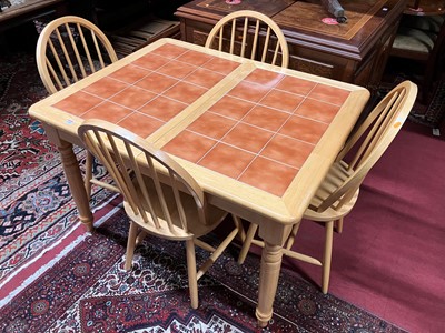 Lot 1286 - A contemporary rubberwood and tile top inset...