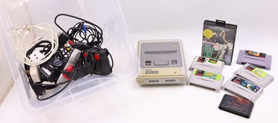 Lot 2029 - Super Nintendo and Sega Mega Drive console and...