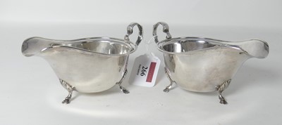 Lot 266 - A pair of George V silver sauceboats, of...