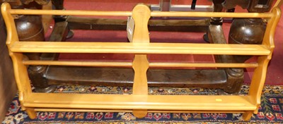 Lot 1311 - An Ercol(?) blond elm and beech two-tier open...