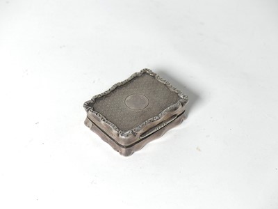 Lot 279 - A George V silver snuffbox, of shaped outline,...