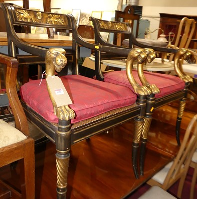 Lot 1320 - A pair of French Empire style Egyptian Revival...