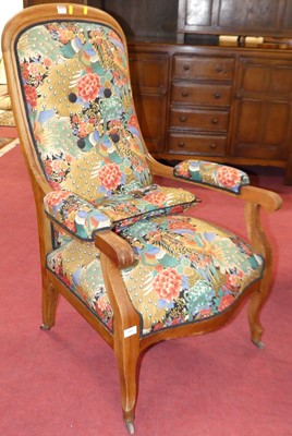 Lot 1337 - A hardwood open armchair, upholstered with...