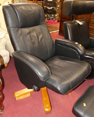 Lot 1340 - A contemporary black leather upholstered...