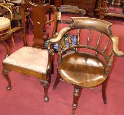 Lot 1349 - A mid-Georgian style walnut splatback elbow...