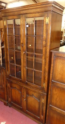 Lot 1372 - A contemporary joined oak freestanding...