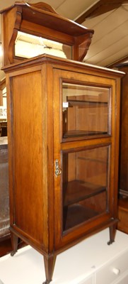 Lot 1380 - An Edwardian walnut mirrorback single door...