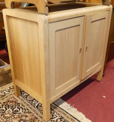 Lot 1389 - A contemporary blond oak double door side...