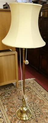 Lot 1390 - A turned brass standard lamp with shade