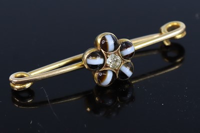 Lot 332 - A circa 1900 yellow metal banded agate and...